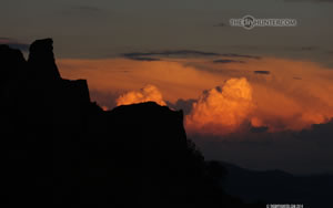 cliffs clouds and sunset