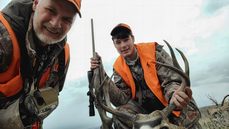 Selfie of Kaden and his 2021 mule deer buck.